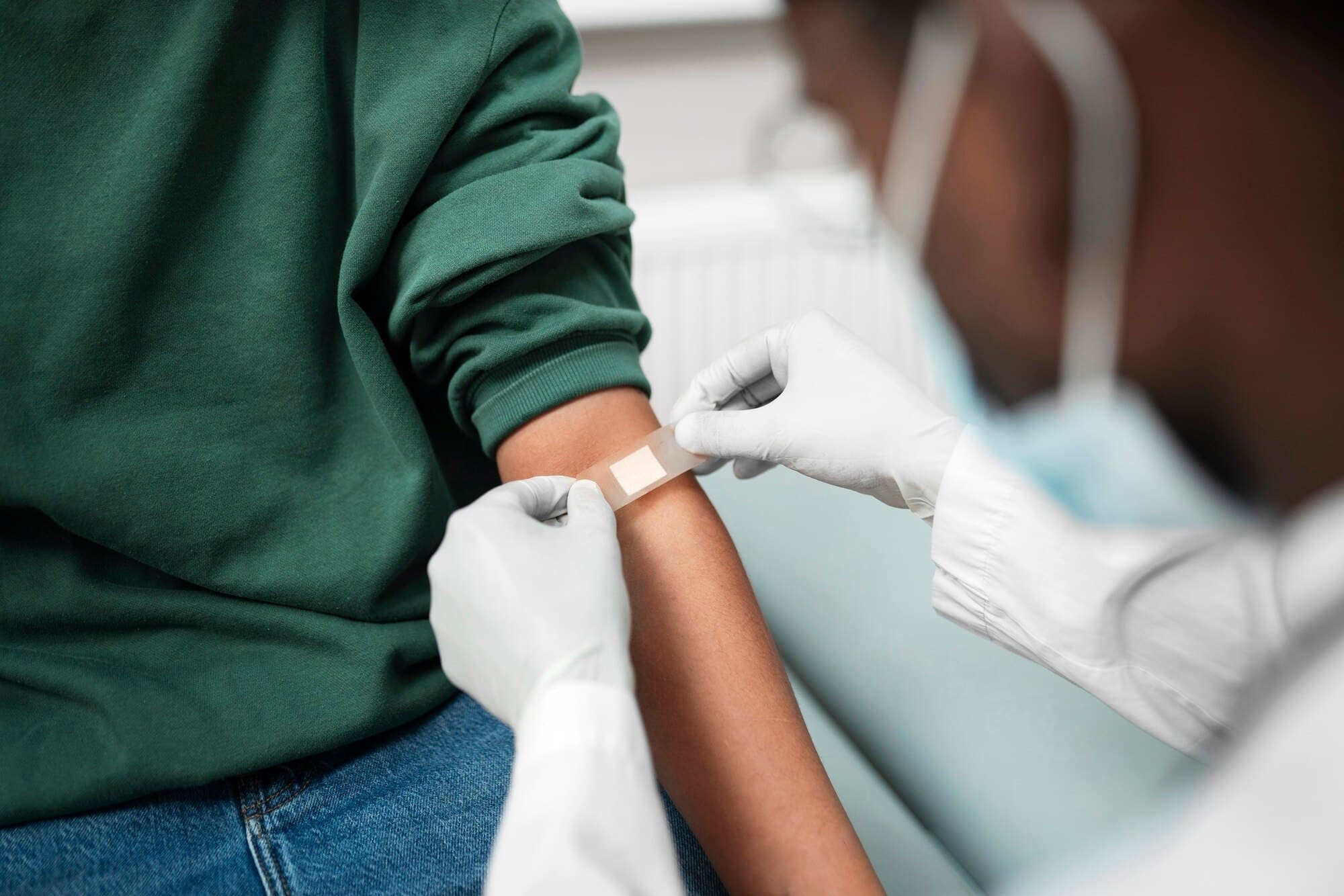 arm getting bandage image